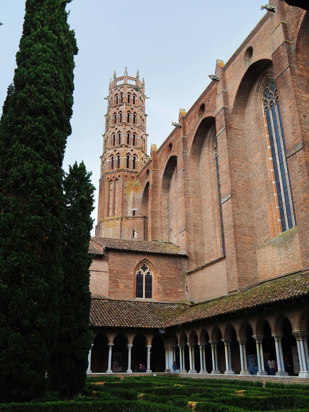 a large brick building with a tower