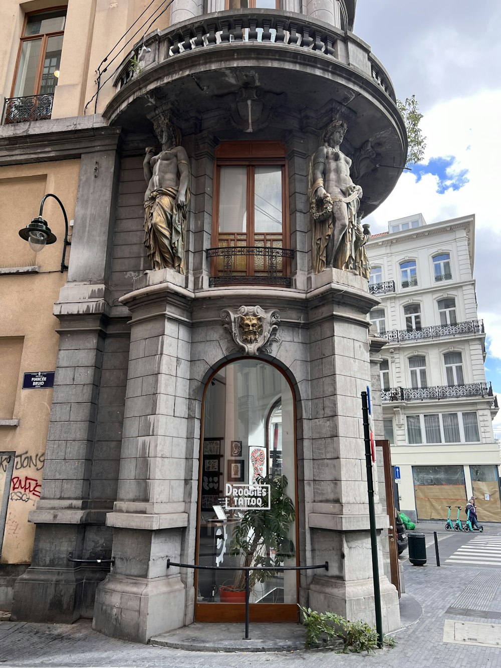 a building with a statue on the front