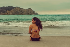 a person sitting on a beach