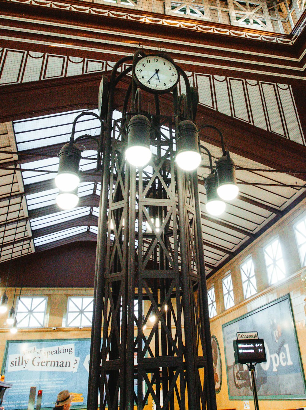 a clock on a pole