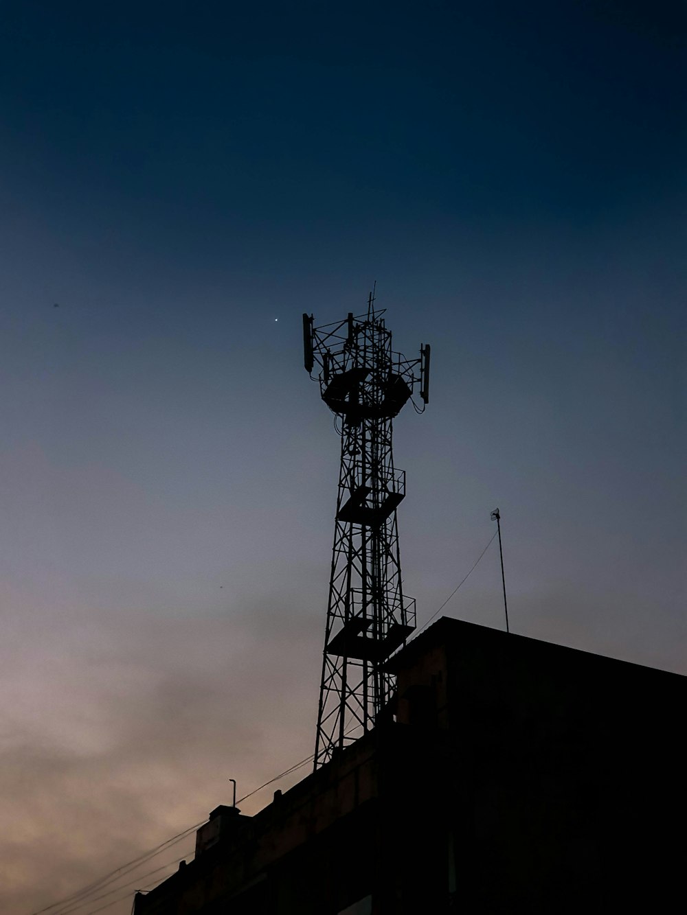 a tower with a antenna on top