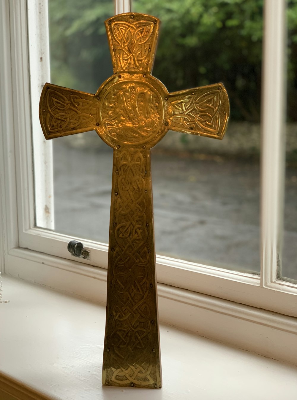 a gold and silver cross