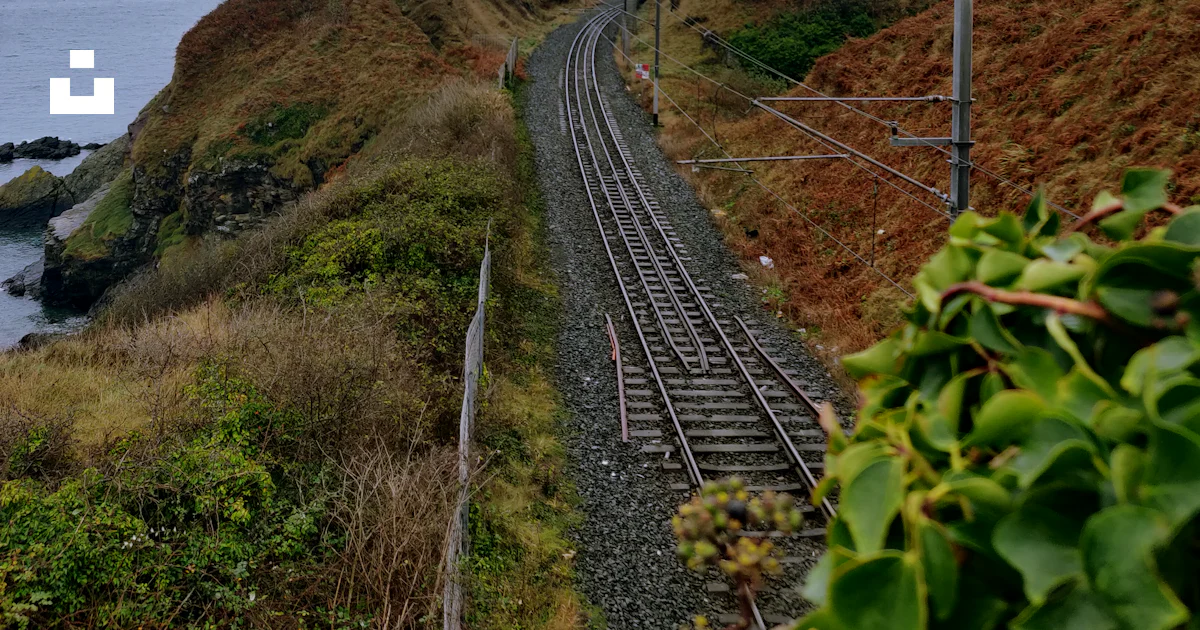 Hill Train System Train tracks going through a hilly area photo – Free Bray Image on Unsplash