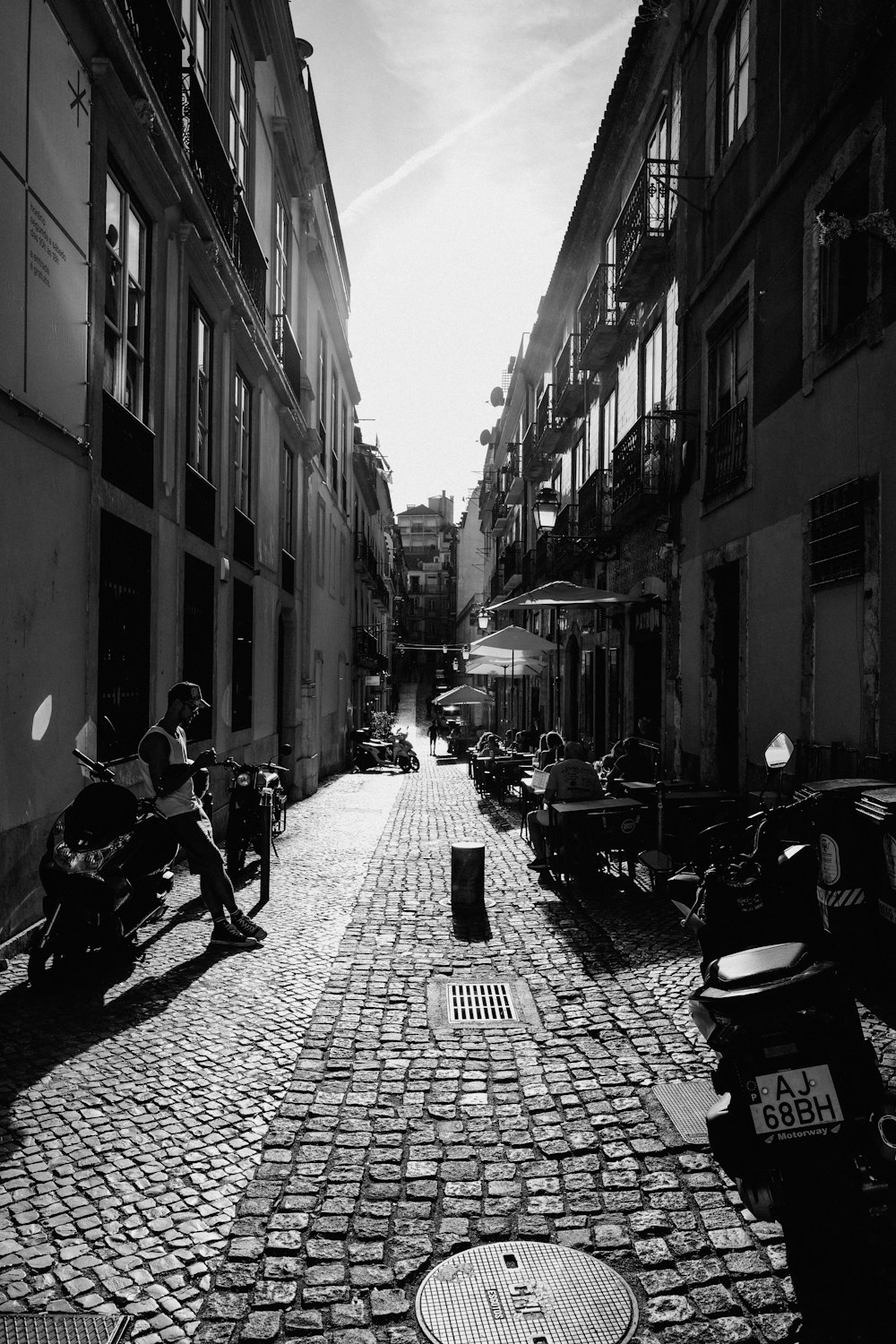 a person riding a bicycle down a city street