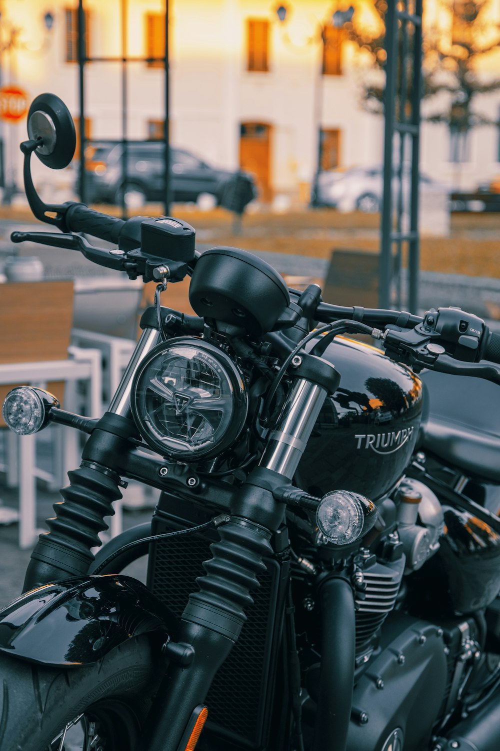 a motorcycle parked on the side of a street