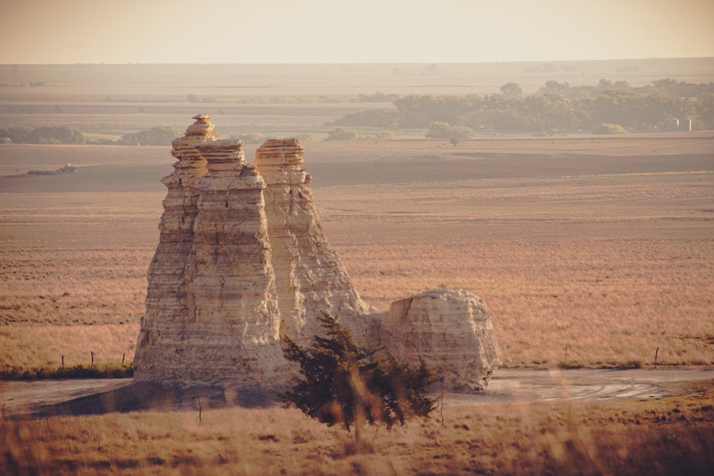 a group of large rocks in a desert