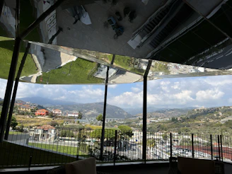 A panoramic view of a multimedia scene with layered visual effects and textures.