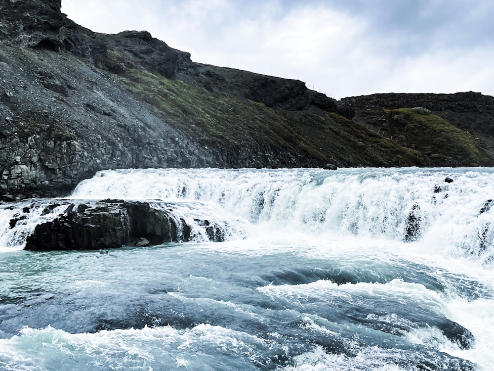 a river flowing through a rocky area