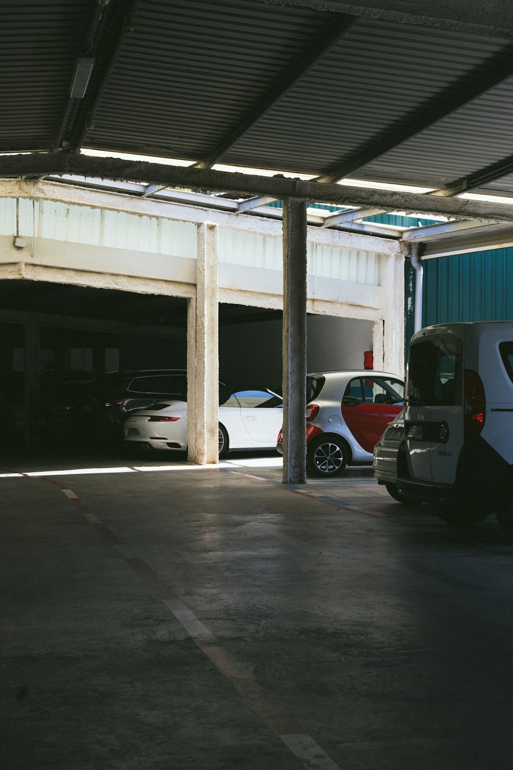 cars parked under a covered area