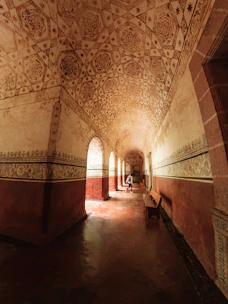 a person walking in a hallway