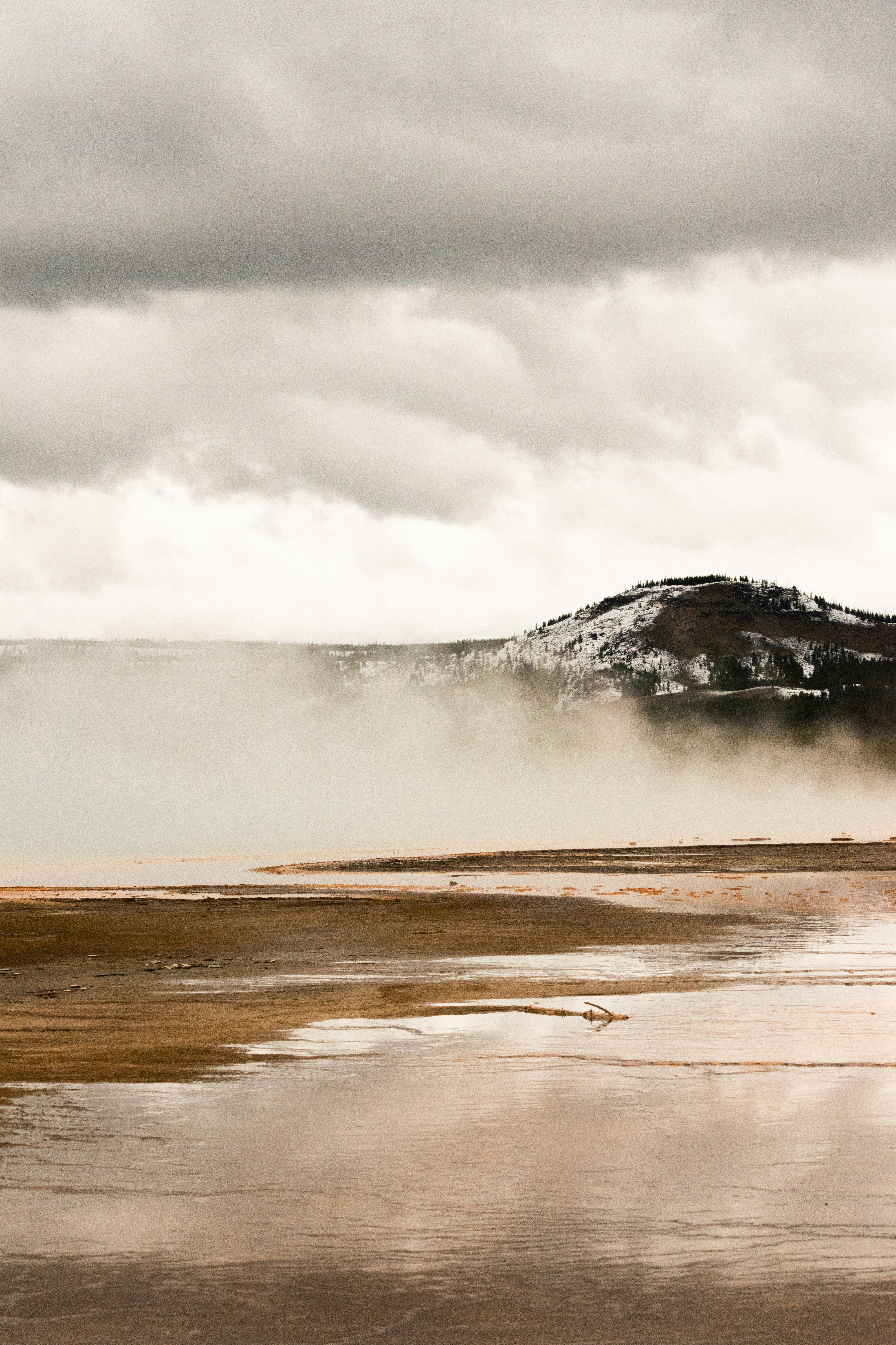 a snowy mountain in the distance