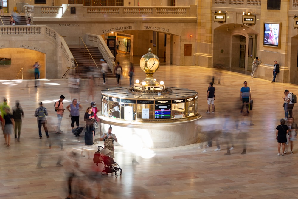 a group of people in a large building