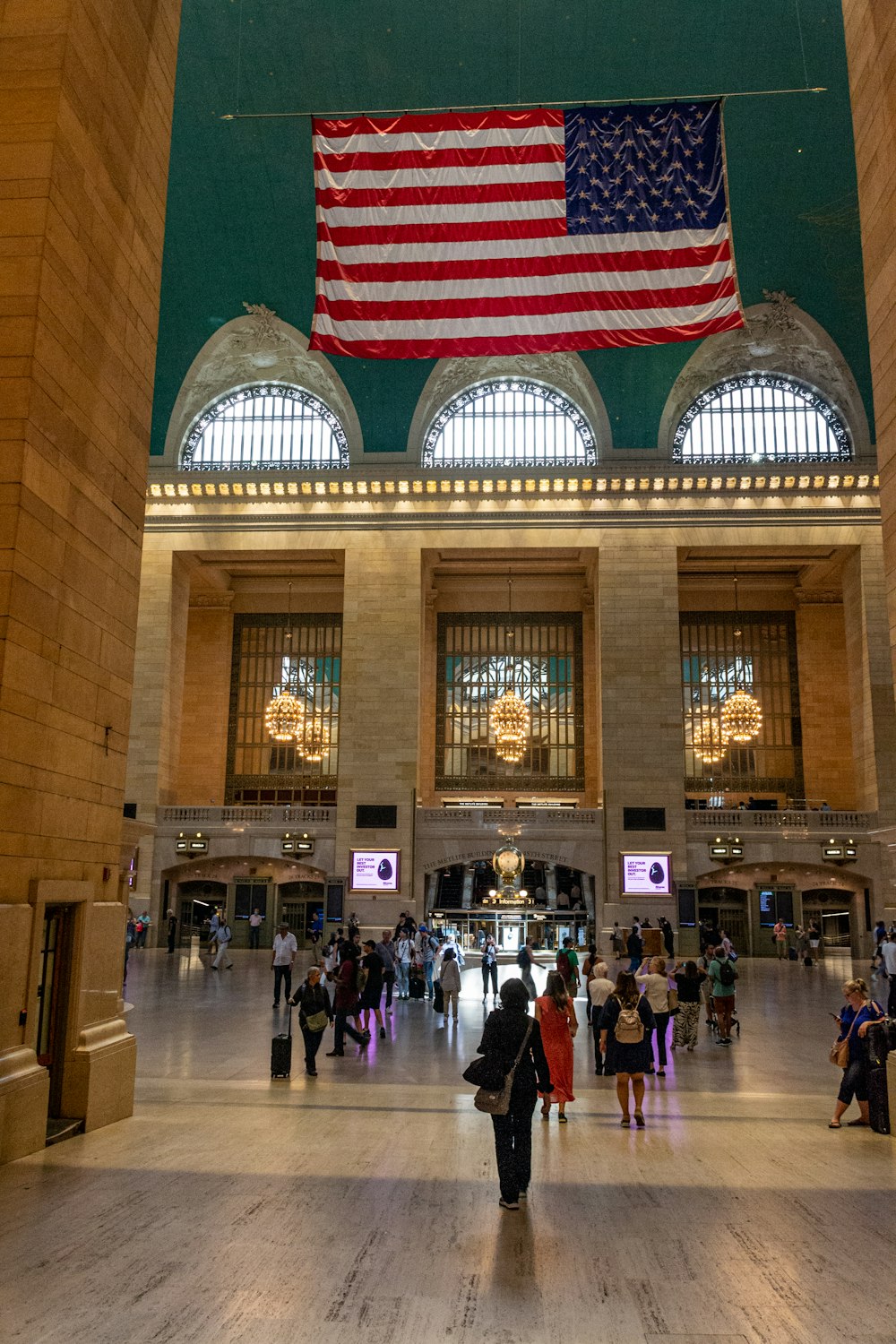 a large building with a flag from the ceiling