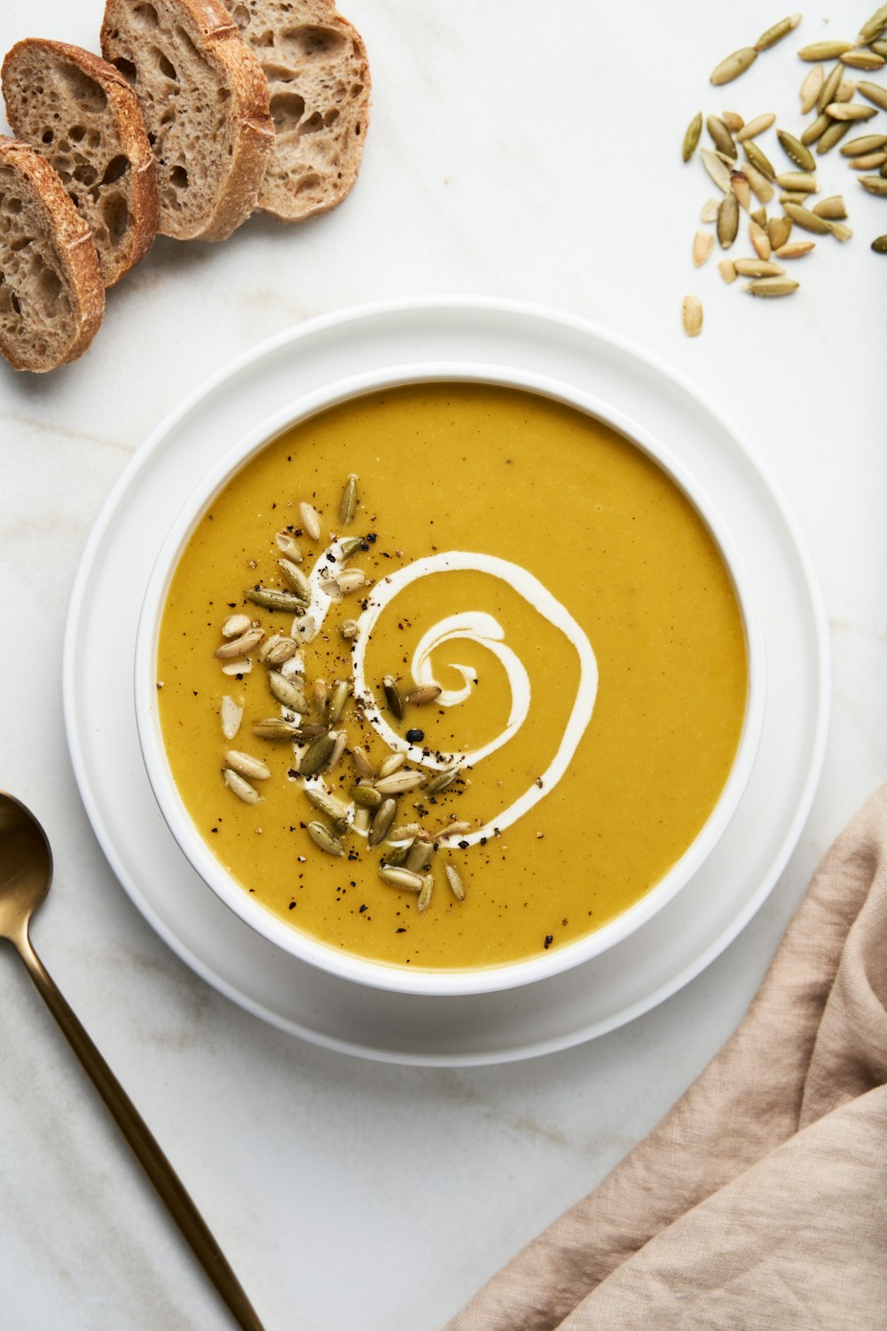 a bowl of soup with meat and vegetables