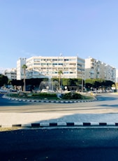 a building with a pool in front of it