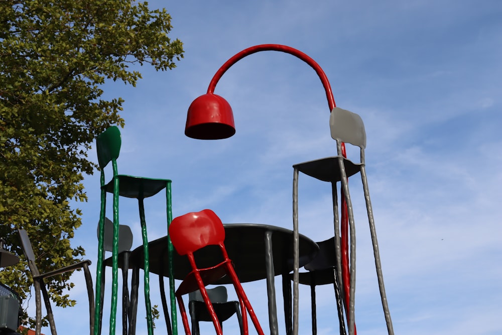 a group of red and white playground toys
