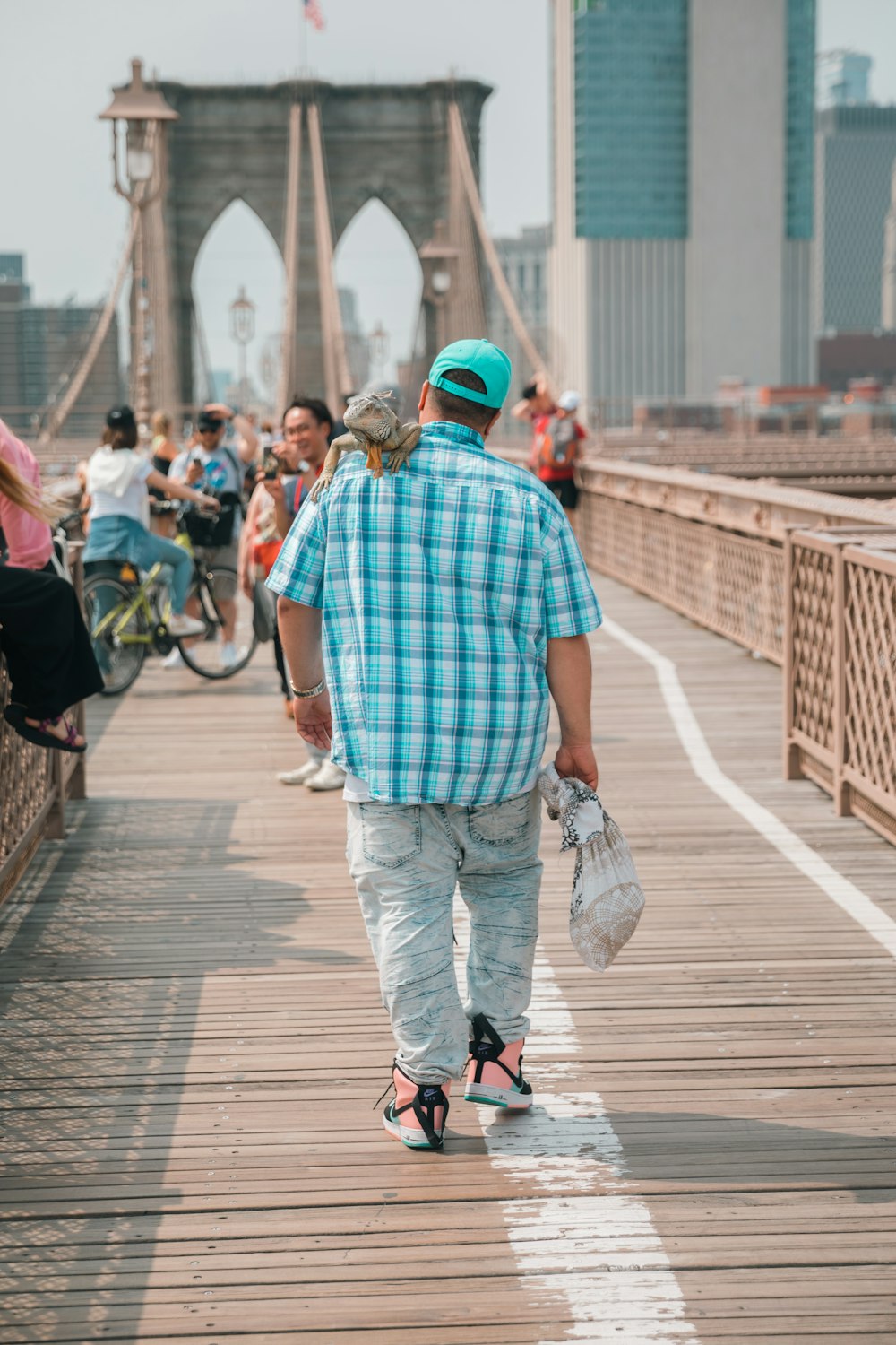 a man walking on a bridge