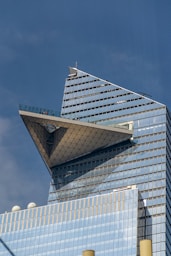 a tall building with glass windows