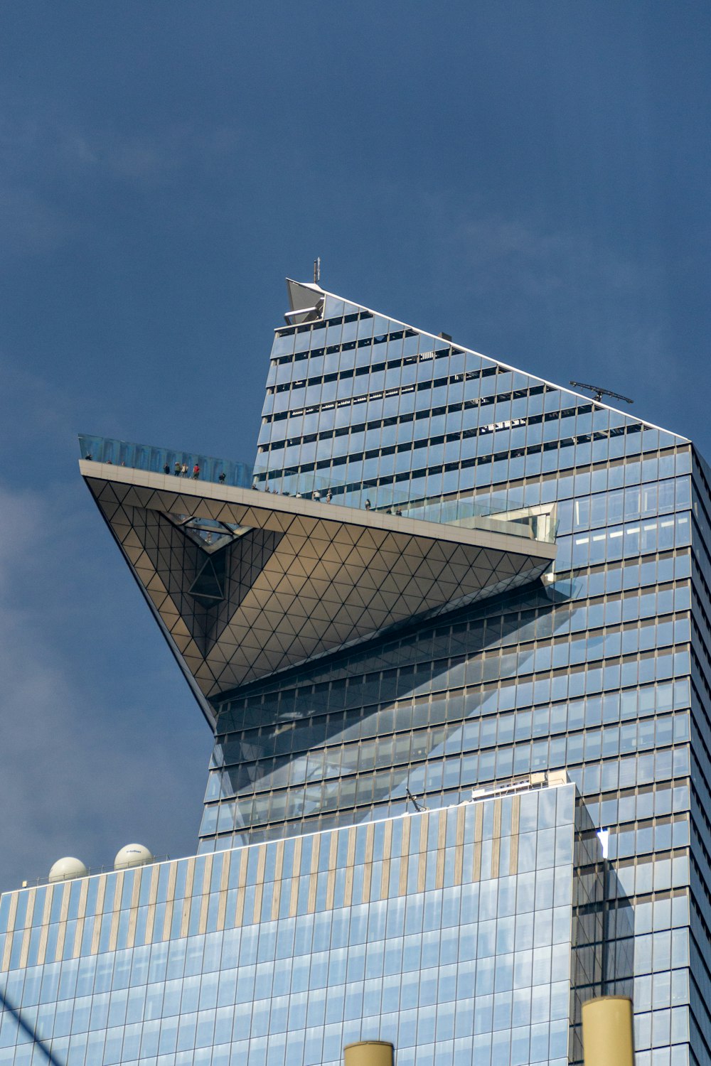 a tall building with glass windows