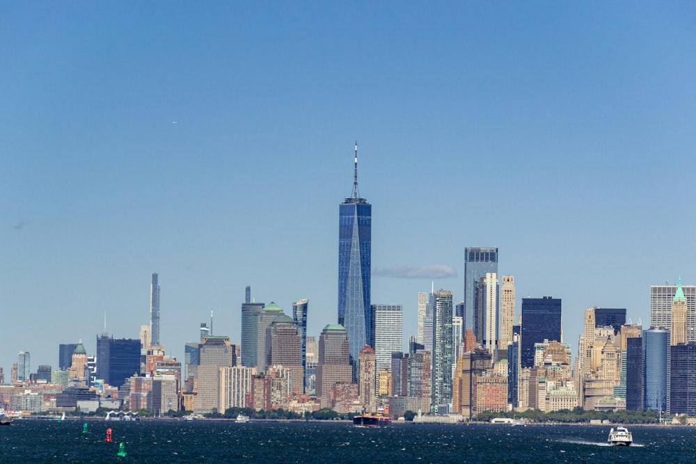 a city skyline with boats