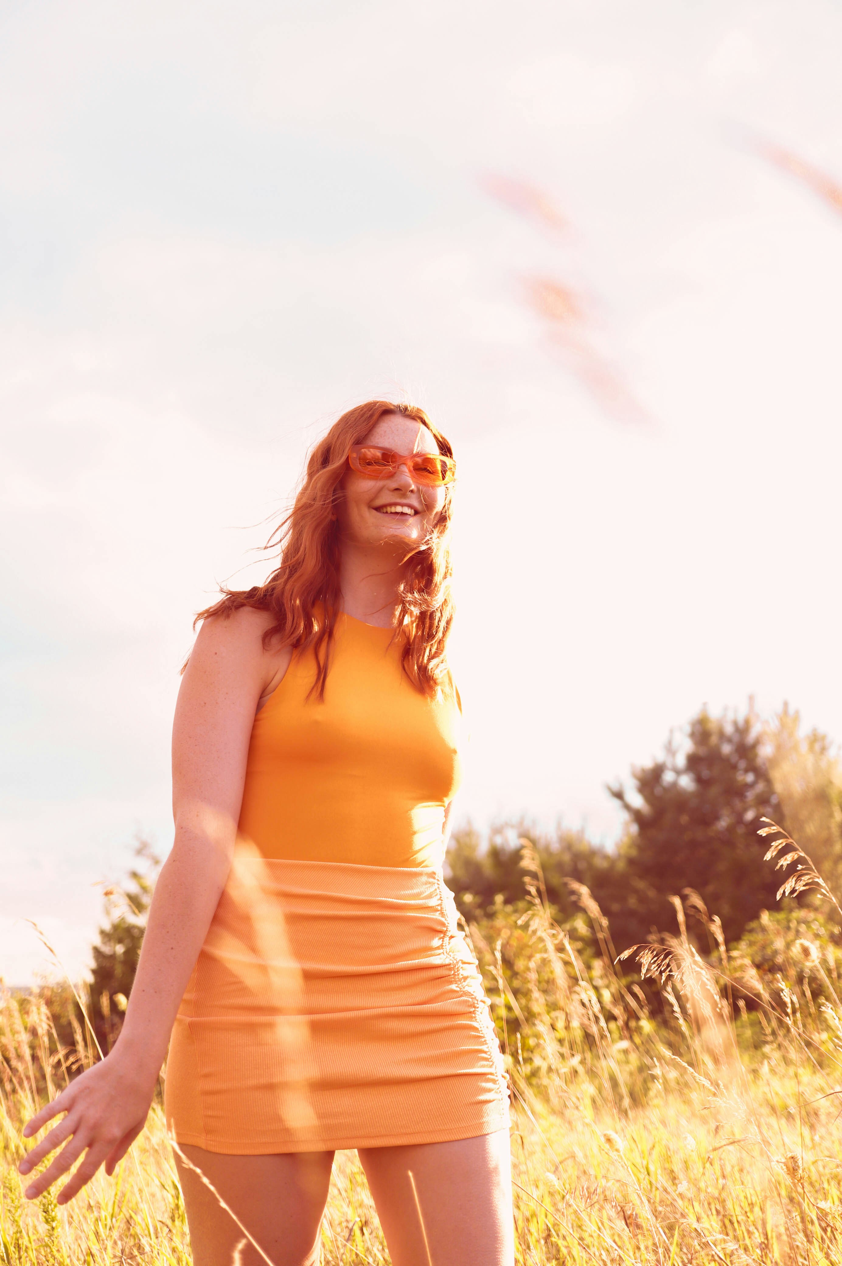 A woman in a dress photo – Free Orange Image on Unsplash