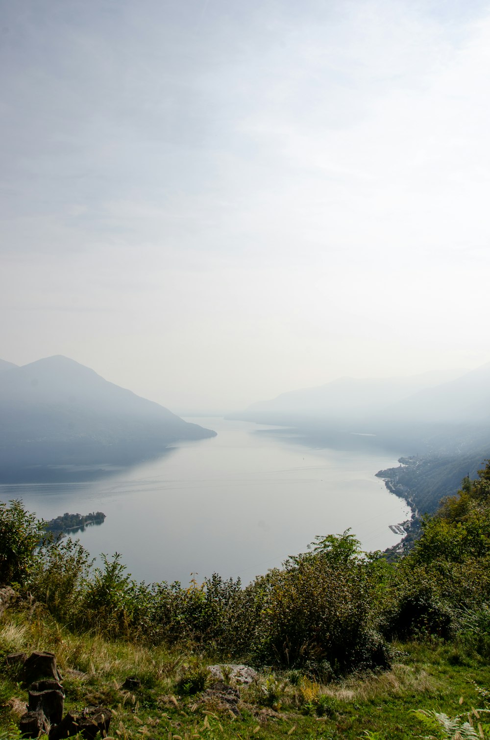 a body of water with hills around it