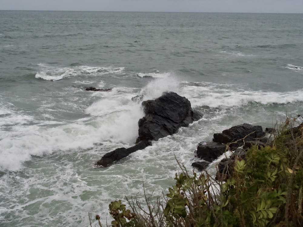 waves crashing on rocks