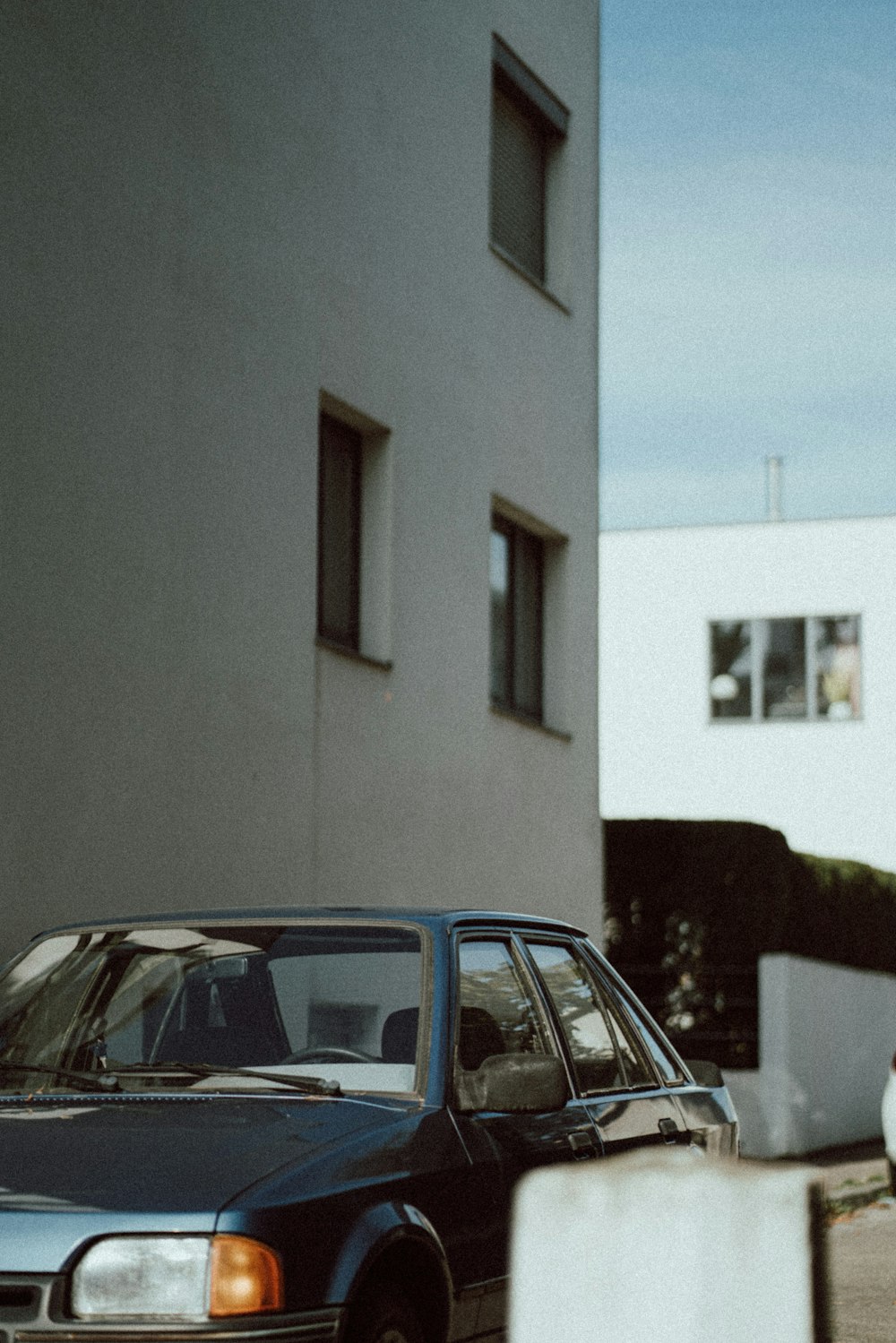 a car parked in front of a building