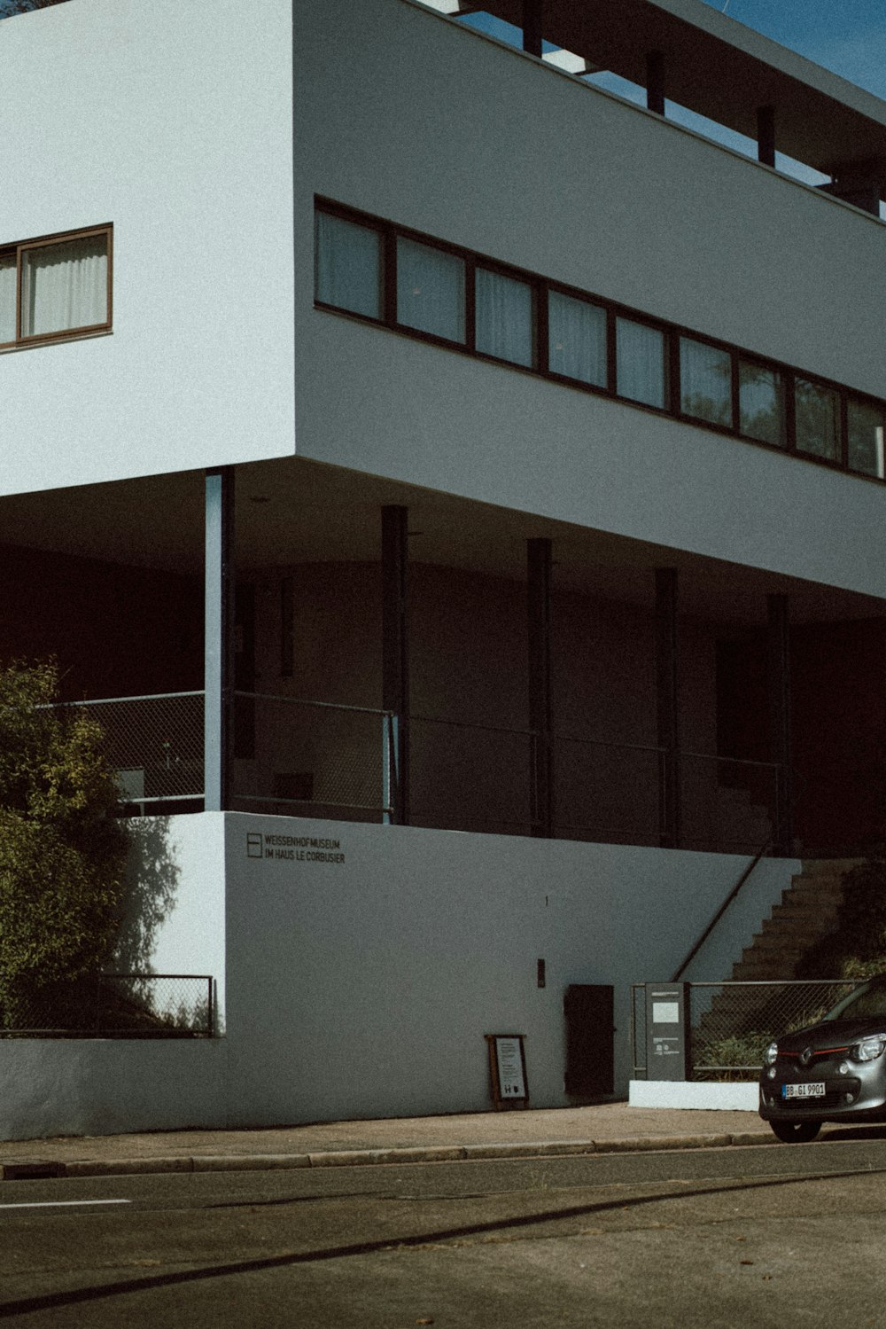 a building with a car parked in front of it