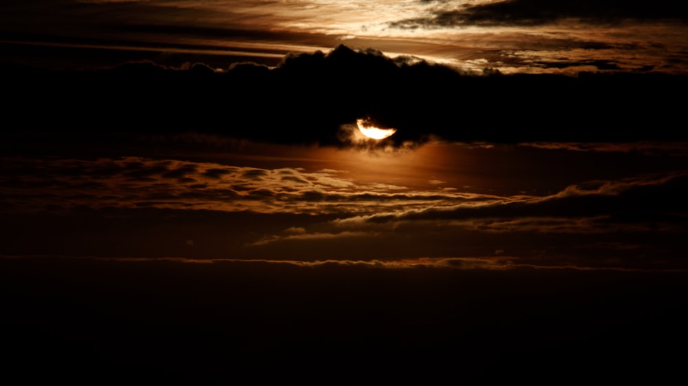 a sunset over a body of water