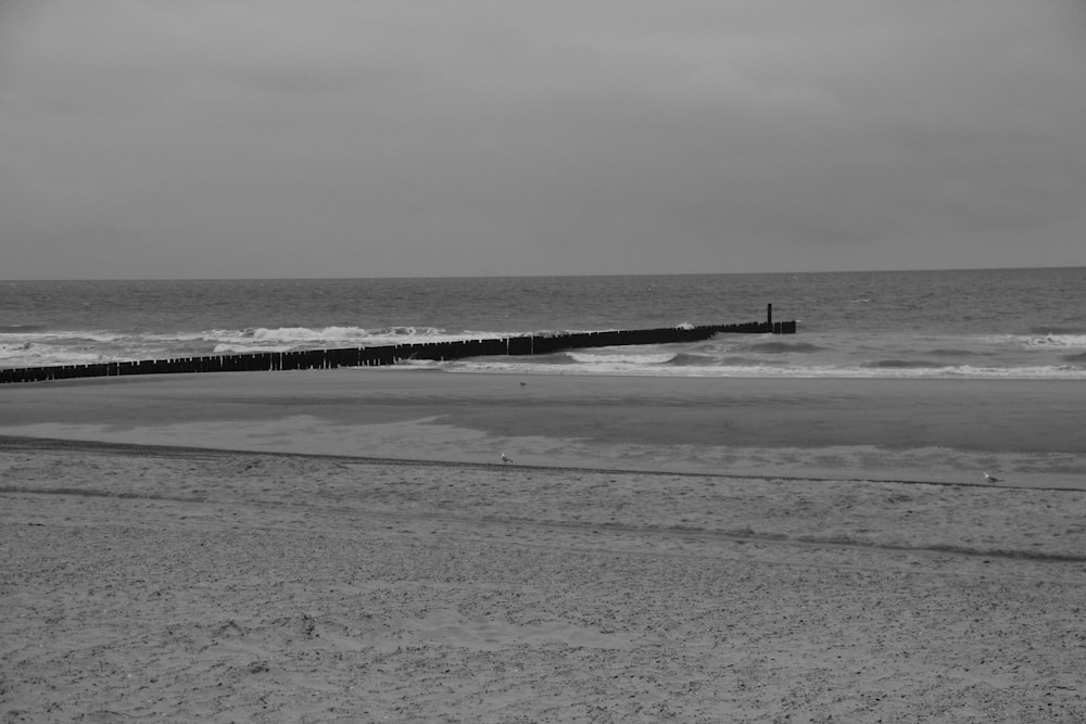 a beach with waves crashing