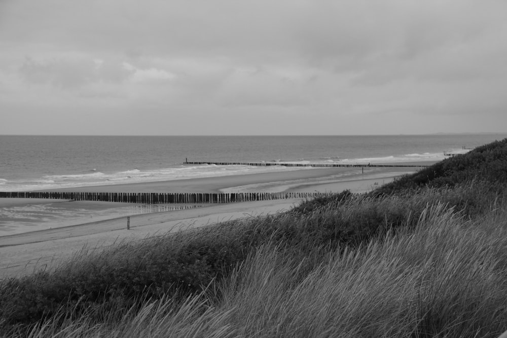 a beach with waves crashing on it