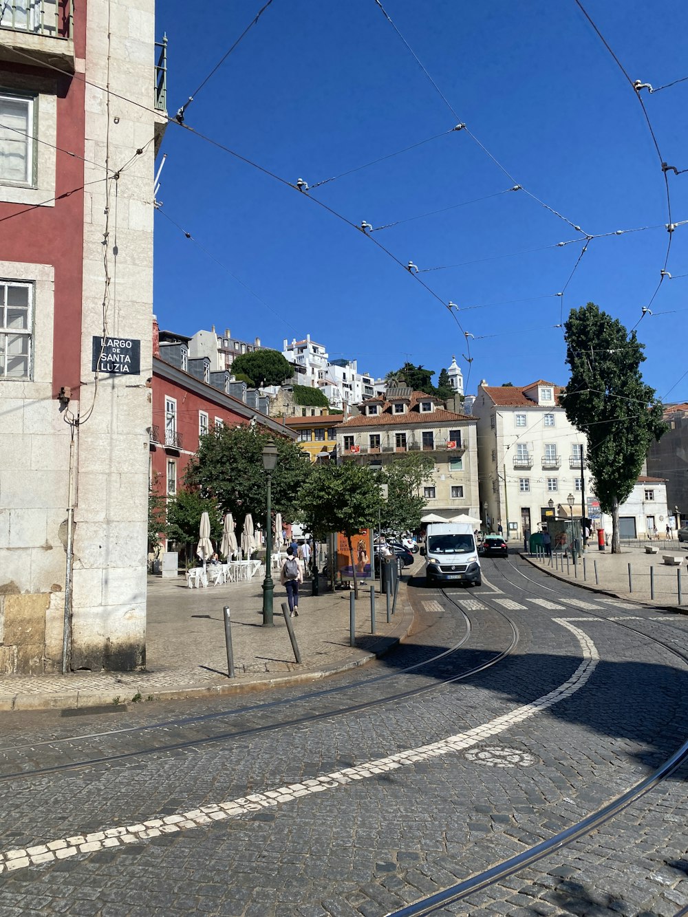 a street with buildings and cars