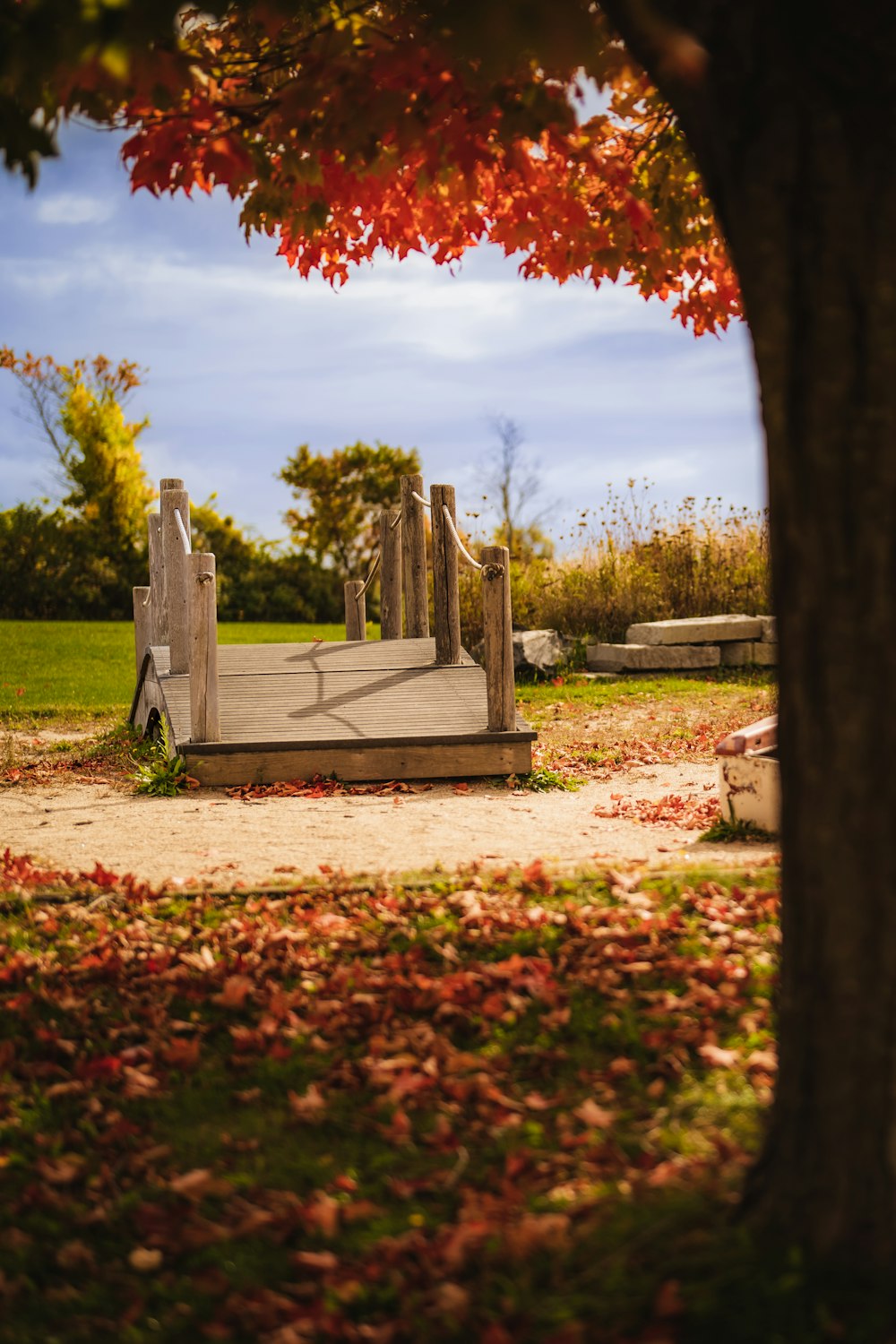 a wooden structure in a park