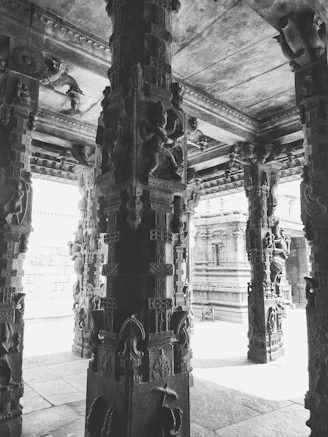a large ornate building with a large pillar