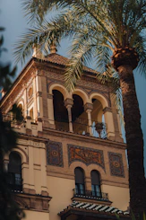a building with a palm tree