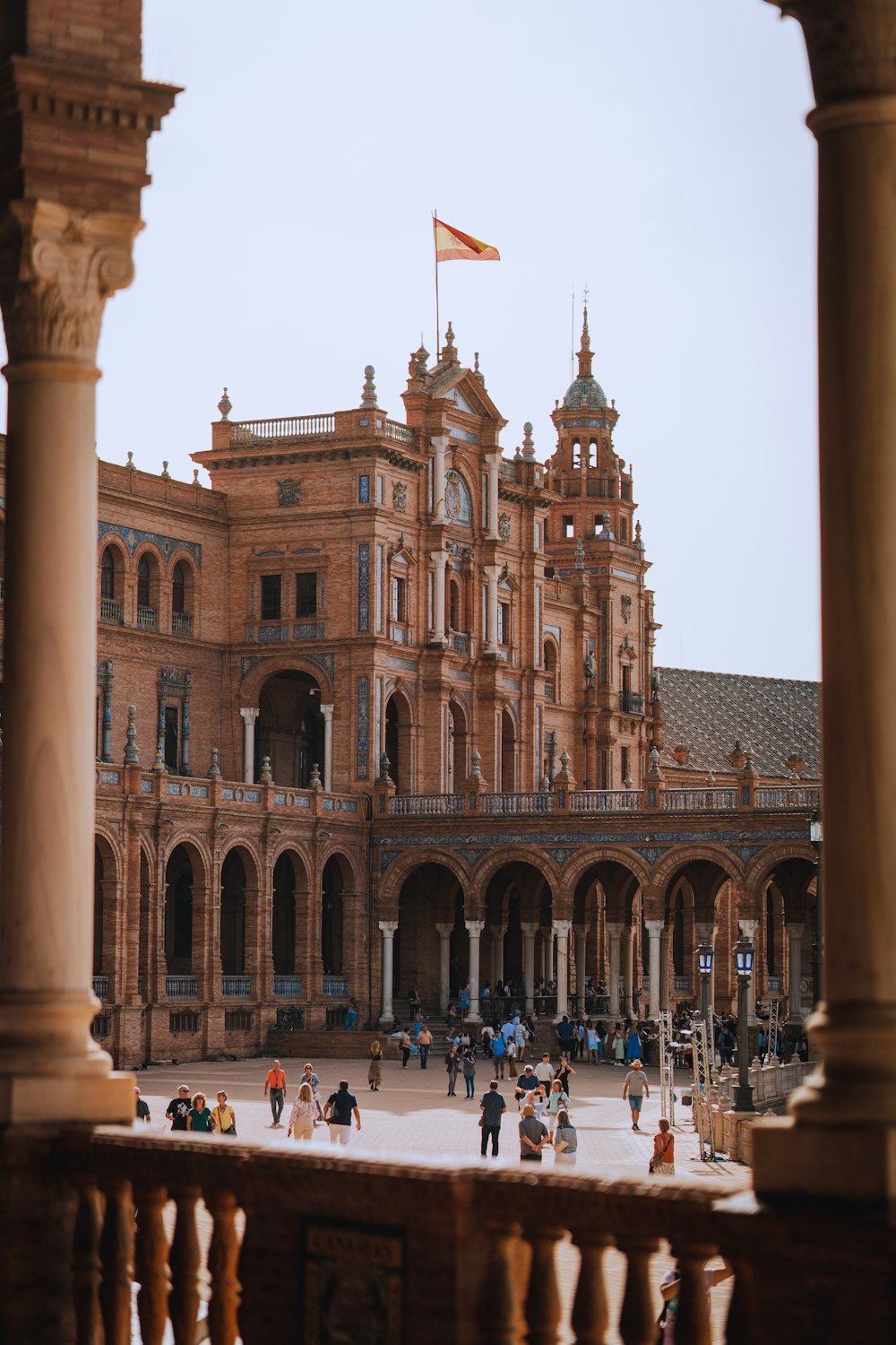 a large building with a flag on top