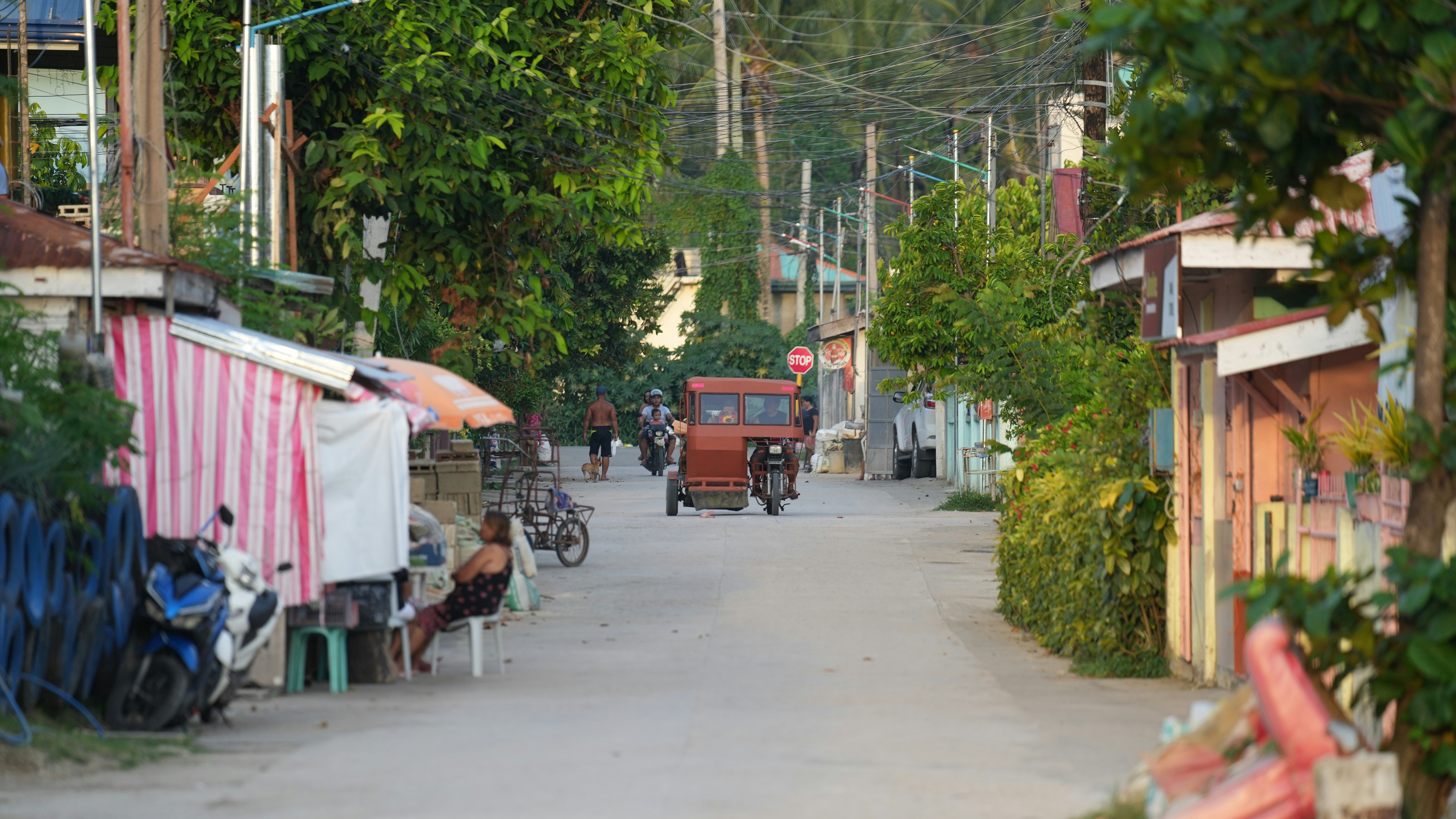 a street with people and buildings
