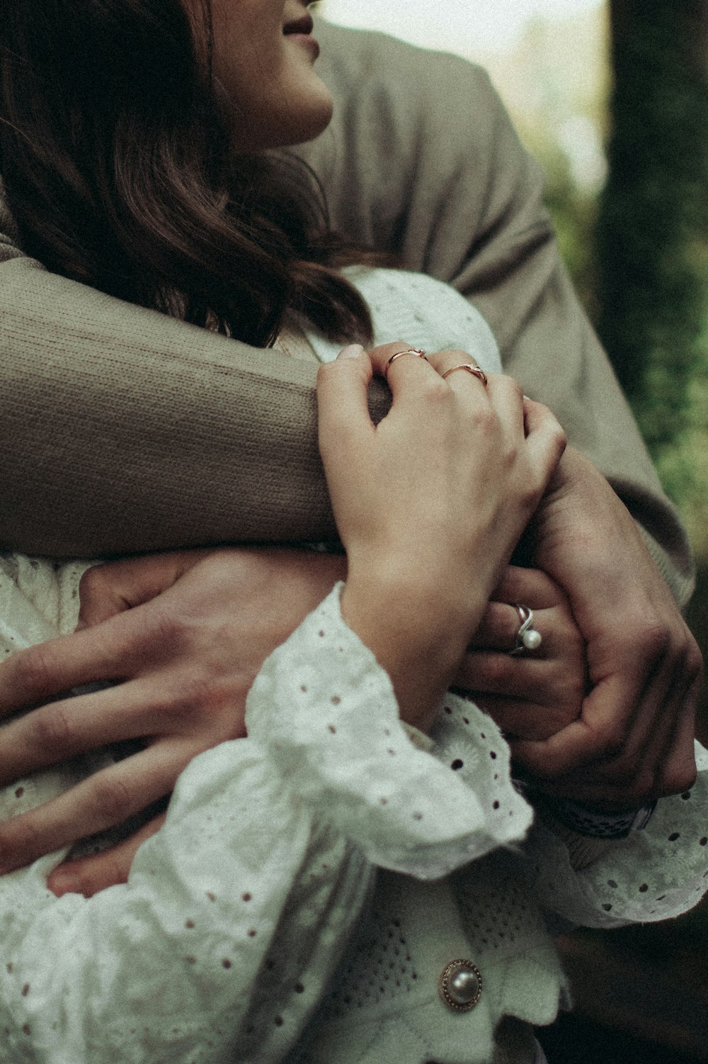 a person holding a baby