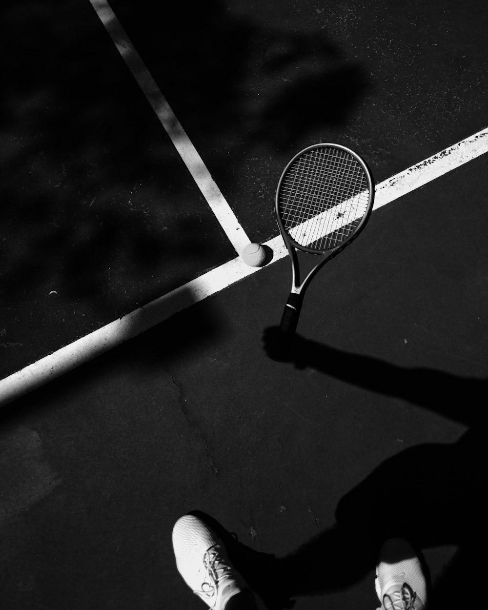 a tennis player is holding a racket