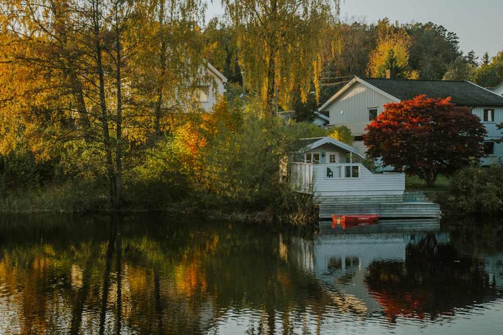 a house with a boat in the water