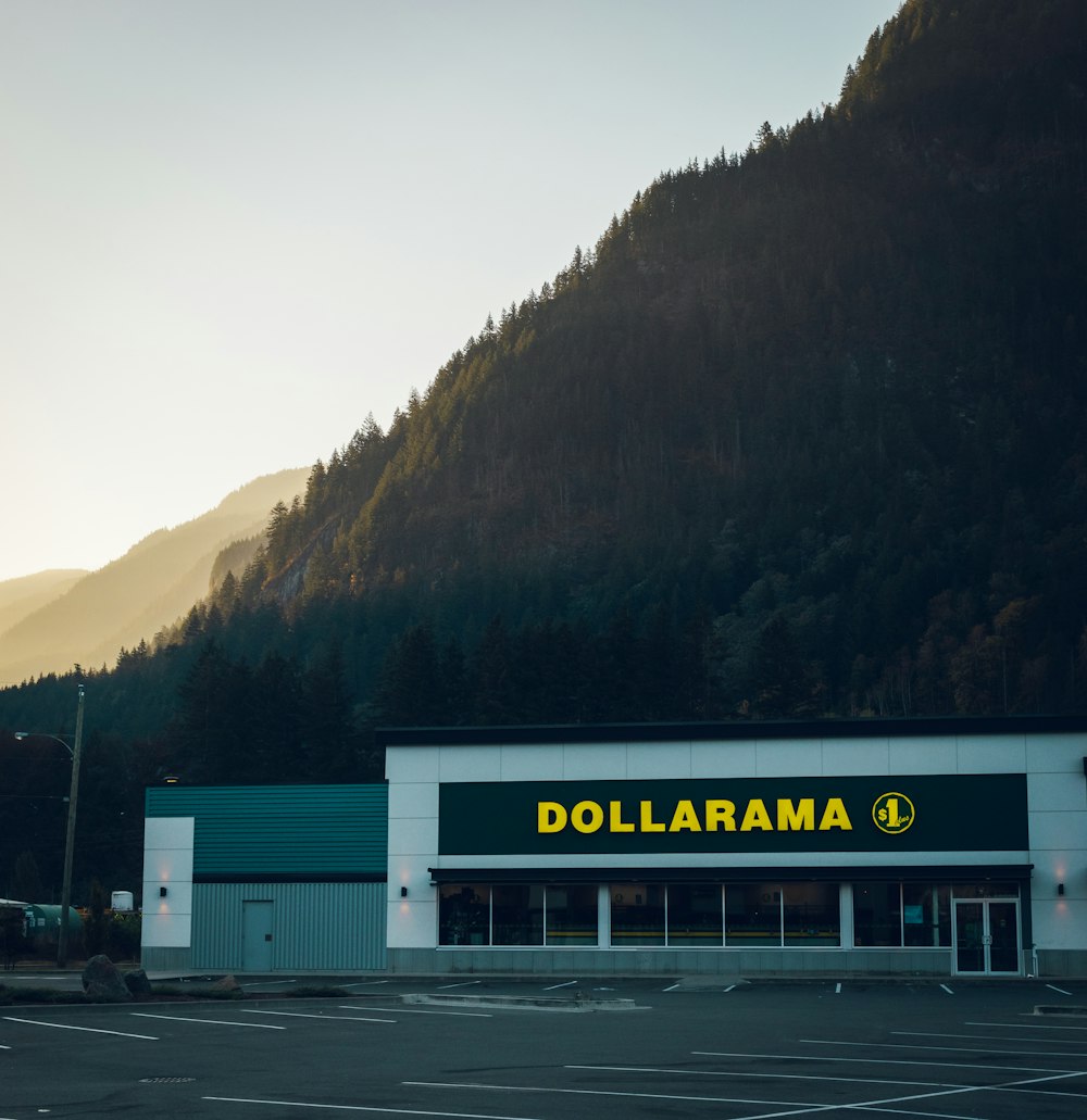 a building with a mountain in the background