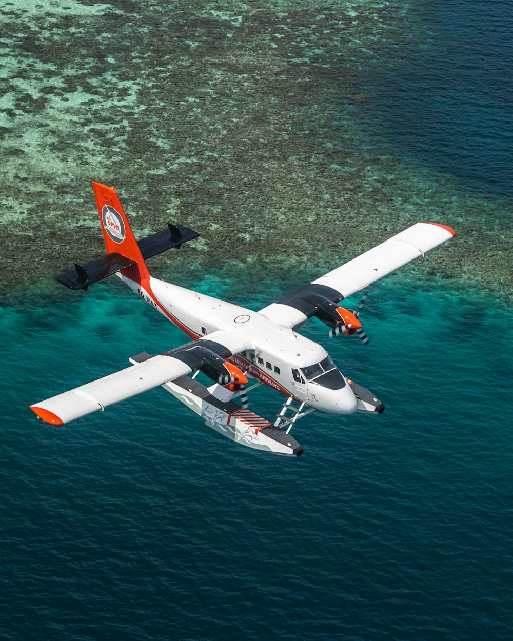 a plane flying over water