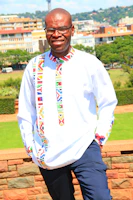 A sunny outdoor scene with a customer trying on a Coco Cat shirt, smiling and enjoying the moment.