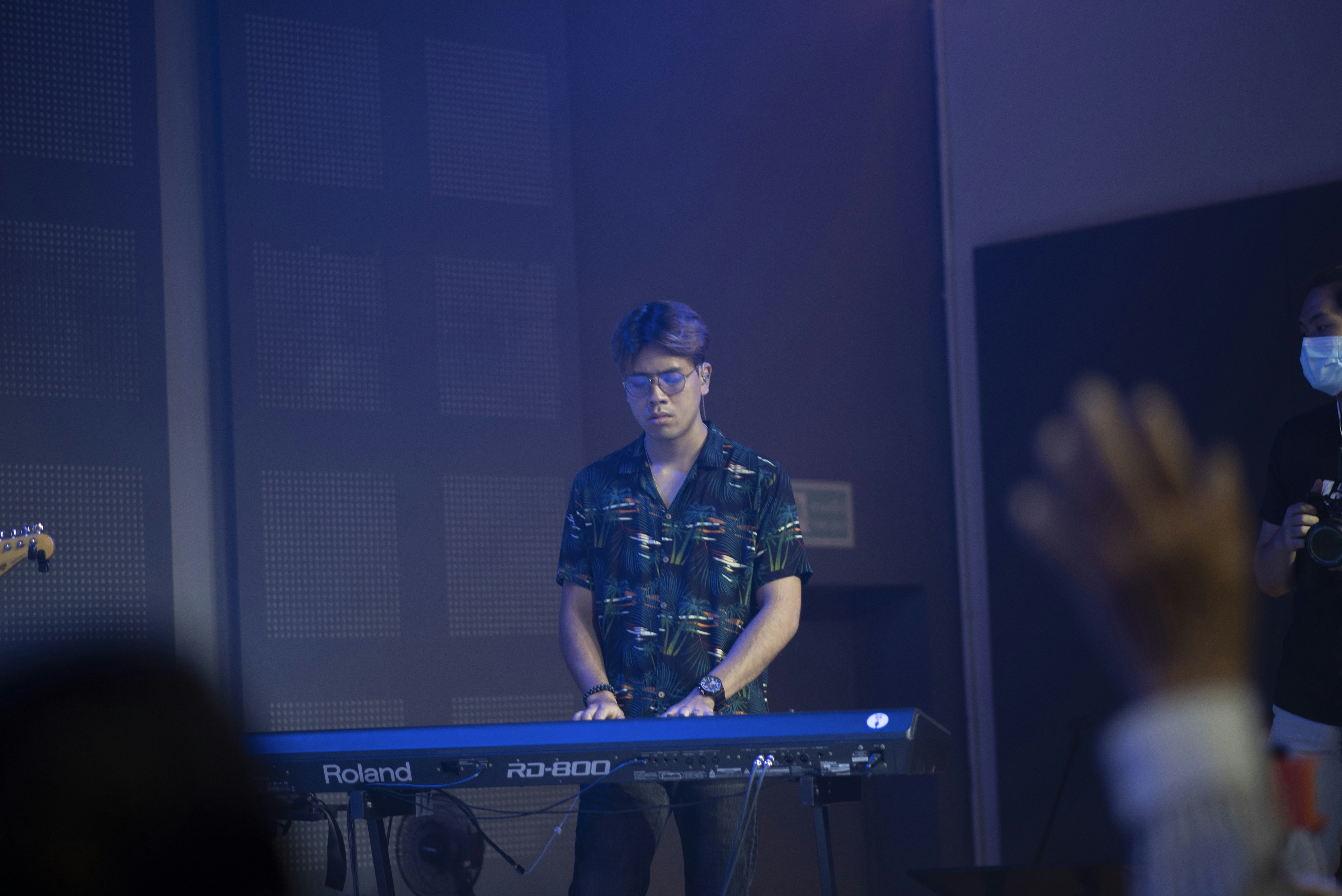 a man playing a keyboard