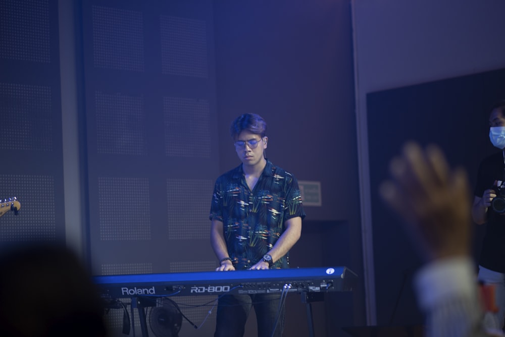 a man playing a keyboard