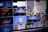 A multi-screen display showing various camera angles and views of a music or worship event. The screens include a live audience, performers on a stage, close-ups of a drummer, and a person speaking or singing. There are also overlay texts with labels such as 'ISO REC', 'Preview', and different camera numbers.