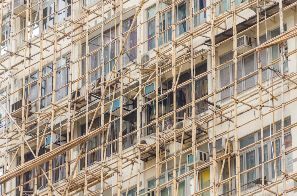 a scaffolding in front of a tall building