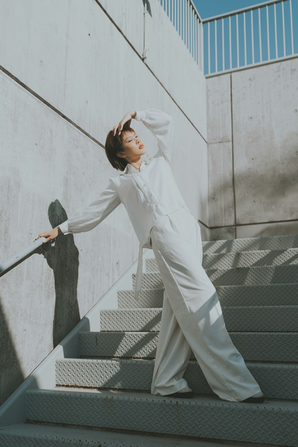 a person in a white suit