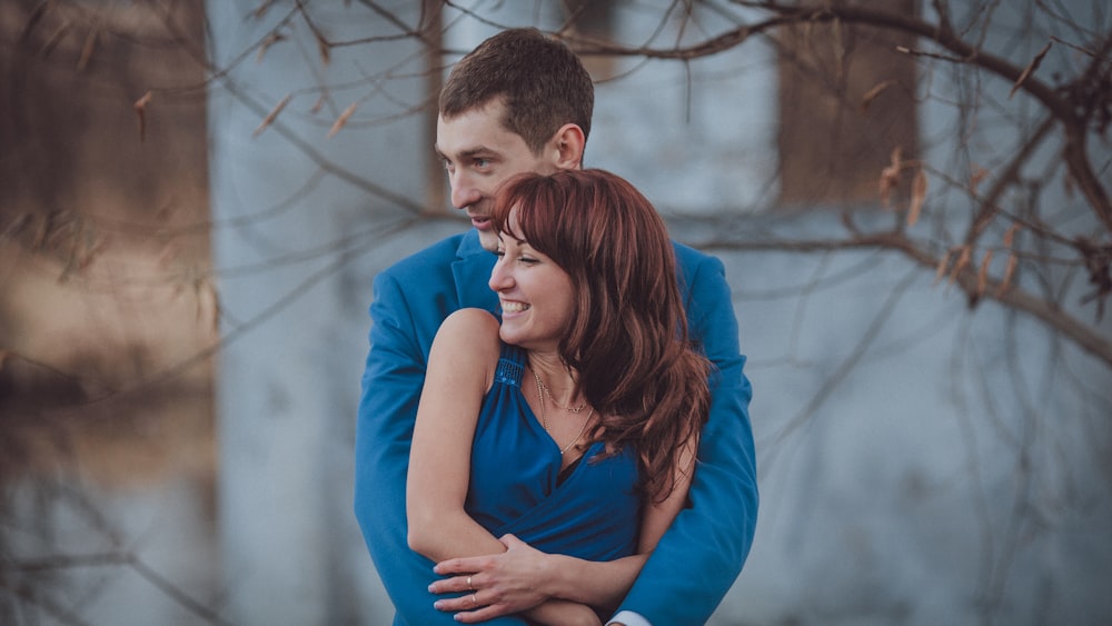 a man and woman hugging